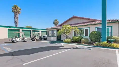 Front offices building with golf carts.