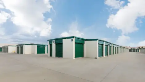 Exterior drive up storage units in a row.