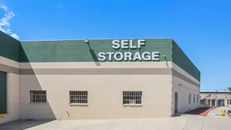 Prominent self storage sign on a building.