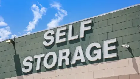 Close up of a white self storage sign.