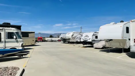 Campers parked in RV storage spaces.