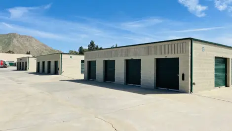 Clusters of green outdoor storage units.