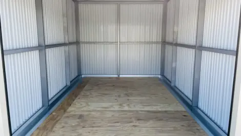 Wood floored storage unit.