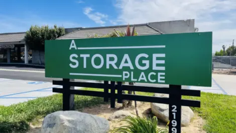 A Storage Place green sign.
