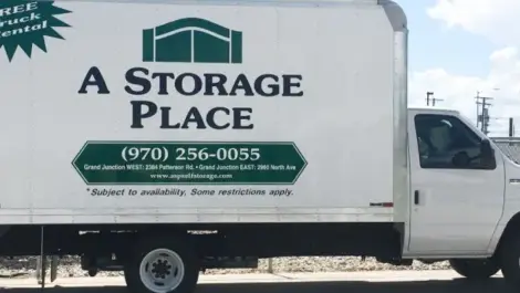 A Storage Place branded moving truck.